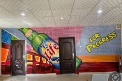 Colorful Mural of Life Beer Bottle and "For Progress" Slogan by Cedar Creative Art